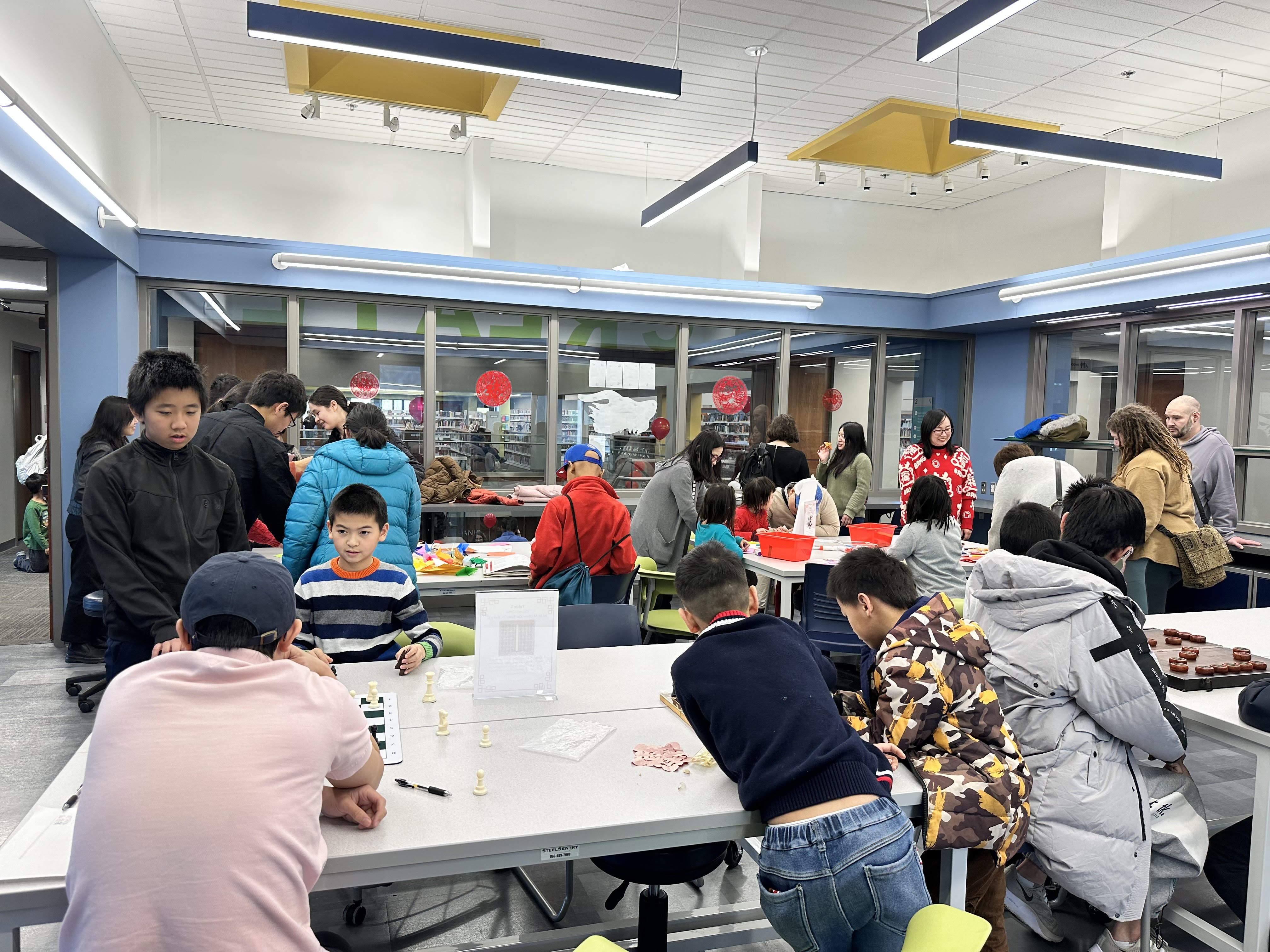 Overall shot of the activity tables in the STEM room.